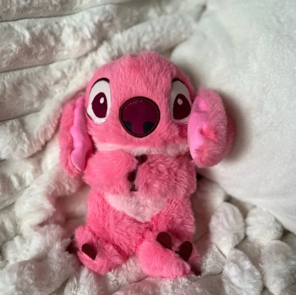 Les peluches Stitch pour le soulagement de l'anxiété & oursons en peluche avec détails sensoriels, musique, lumières et mouvement de respiration rythmique.